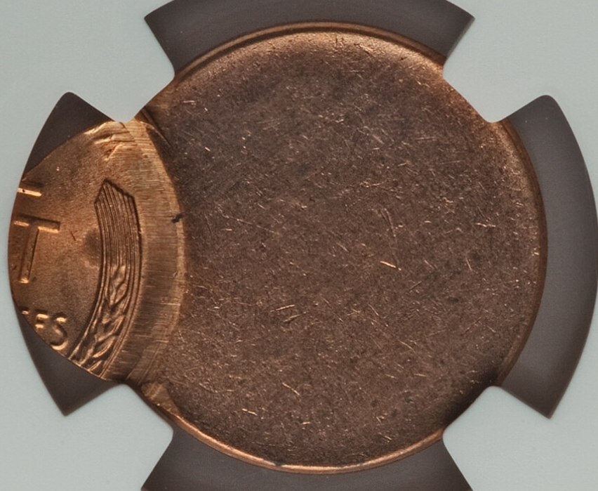 1933 Lincoln Wheat Penny off-center strike error showing blank planchet crescent and shifted Lincoln design with visible date